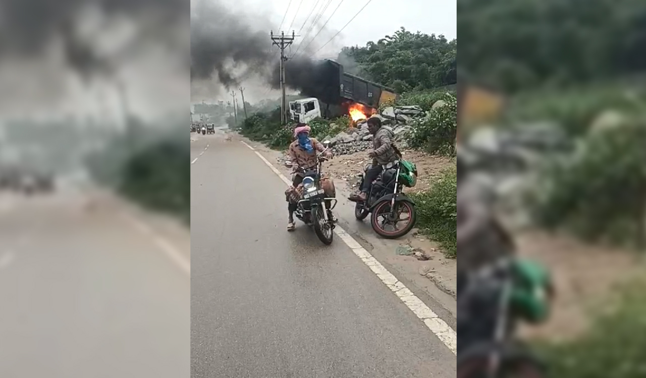 Watch: Driver suffers injuries as truck catches fire after coming in contact with high tension wire in Hyderabad