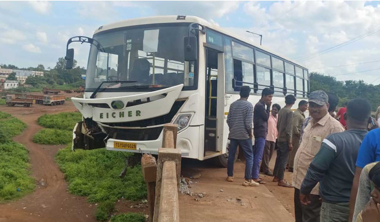 Sangareddy: Driver escapes unhurt after bus rams into railing, hangs off bridge