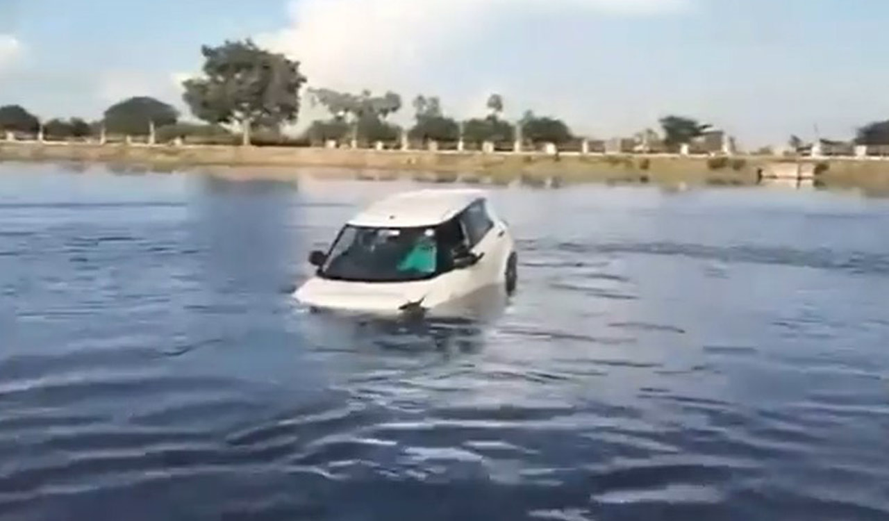 Car driving lessons go awry as learner drives into deep waters at Jangaon