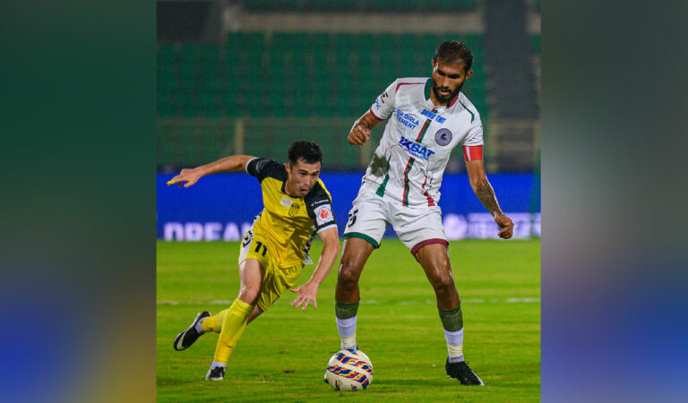 MBSG's Subhasish Bose (right) and HFC's Cy Goddard in action at GMC Balayogi Stadium, Hyderabad on Wednesday.