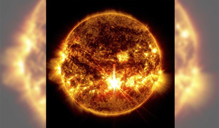 This photo provided by NASA, taken by the Solar Dynamics Observatory, shows a solar flare, the bright flash in the center of the image on Oct. 3, 2024.(Solar Dynamics Observatory/NASA via AP)