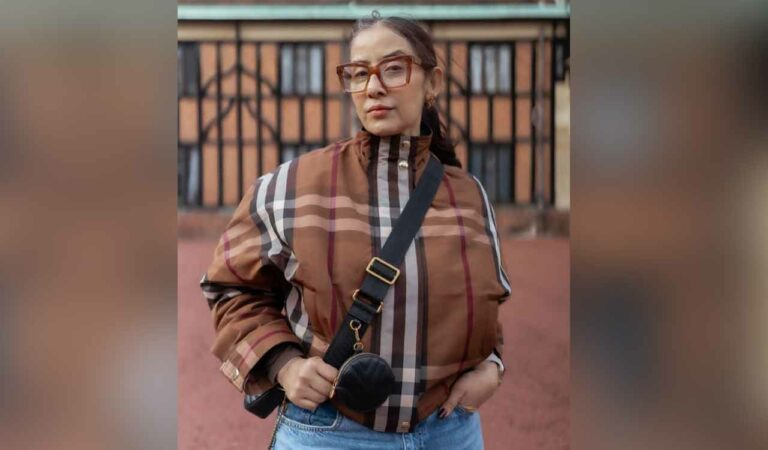 Manisha took to Instagram, where she shared some pictures of herself walking through the lanes of the UK dressed in a Burberry bomber jacket paired with denims. The actress completed her look with a black purse and glasses.