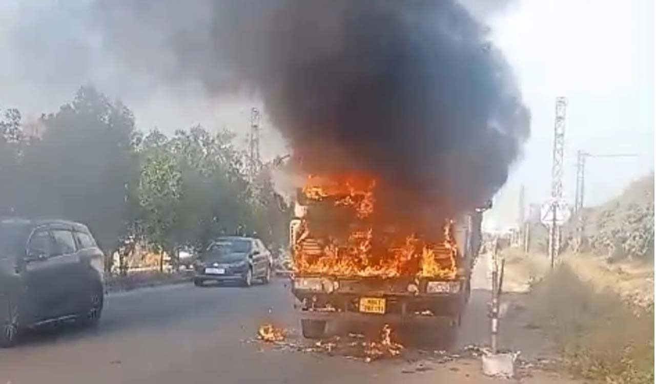 Container lorry goes up in flames in Sangareddy