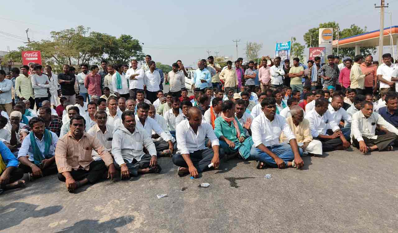 Farmers block road protesting delay in paddy procurement in Nirmal