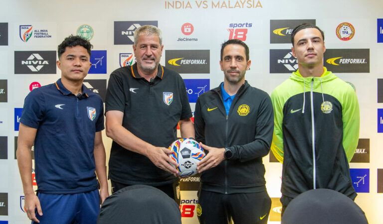 India forward Edmund Lalrindika (left), head coach Manolo Márquez (2nd left), Malaysia head coach Pau Martí and defender Dion Cools in Hyderabad on Sunday.