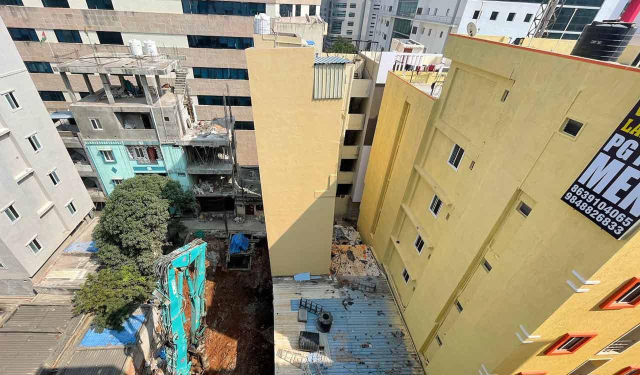 To raze or not to raze? Officials in a fix about tilted building in ...