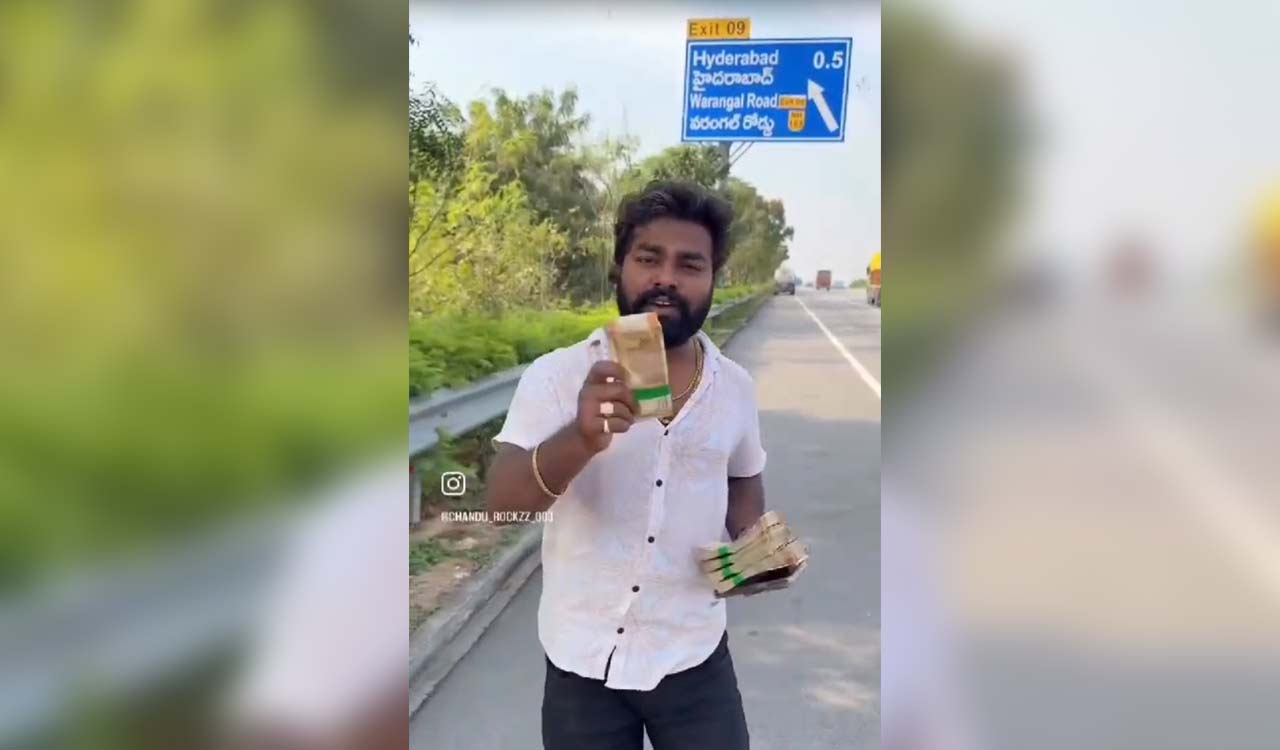 Watch: Reckless YouTuber tosses bundles of cash on ORR for views, booked for public nuisance 