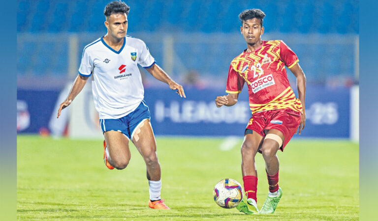 Players of West Bengal and Kerala vie for the ball during the Santosh Trophy final match in Hyderabad, on Tuesday.