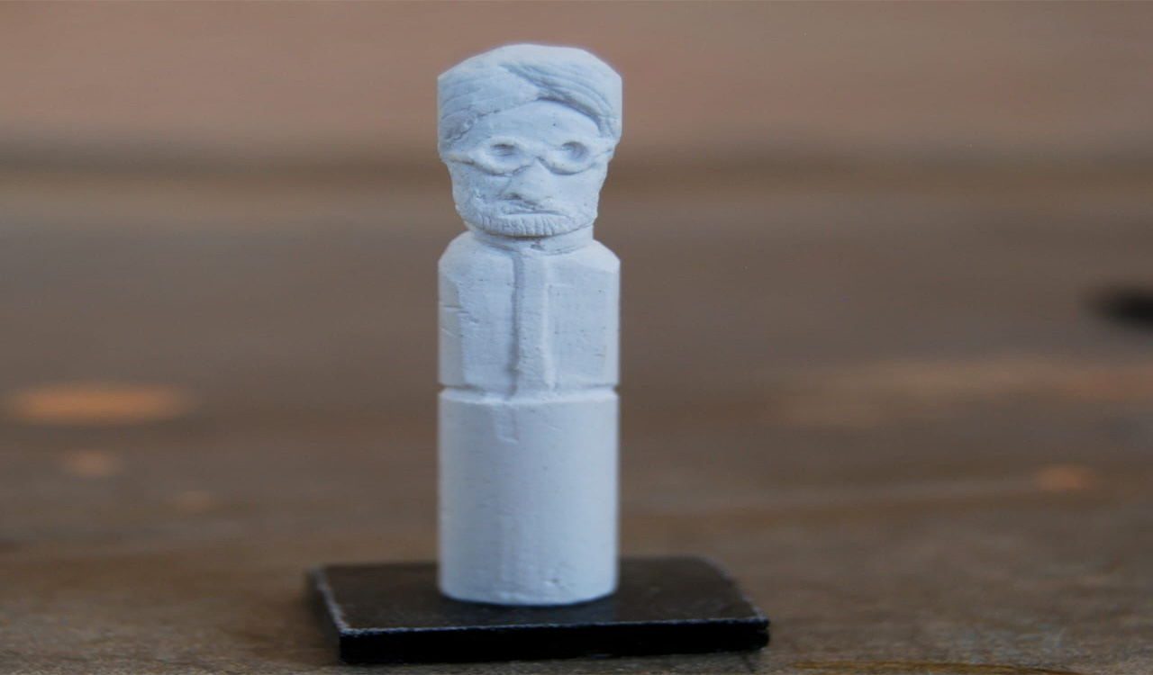 Telangana: Micro artiste carves Manmohan Singh image on a piece of chalk