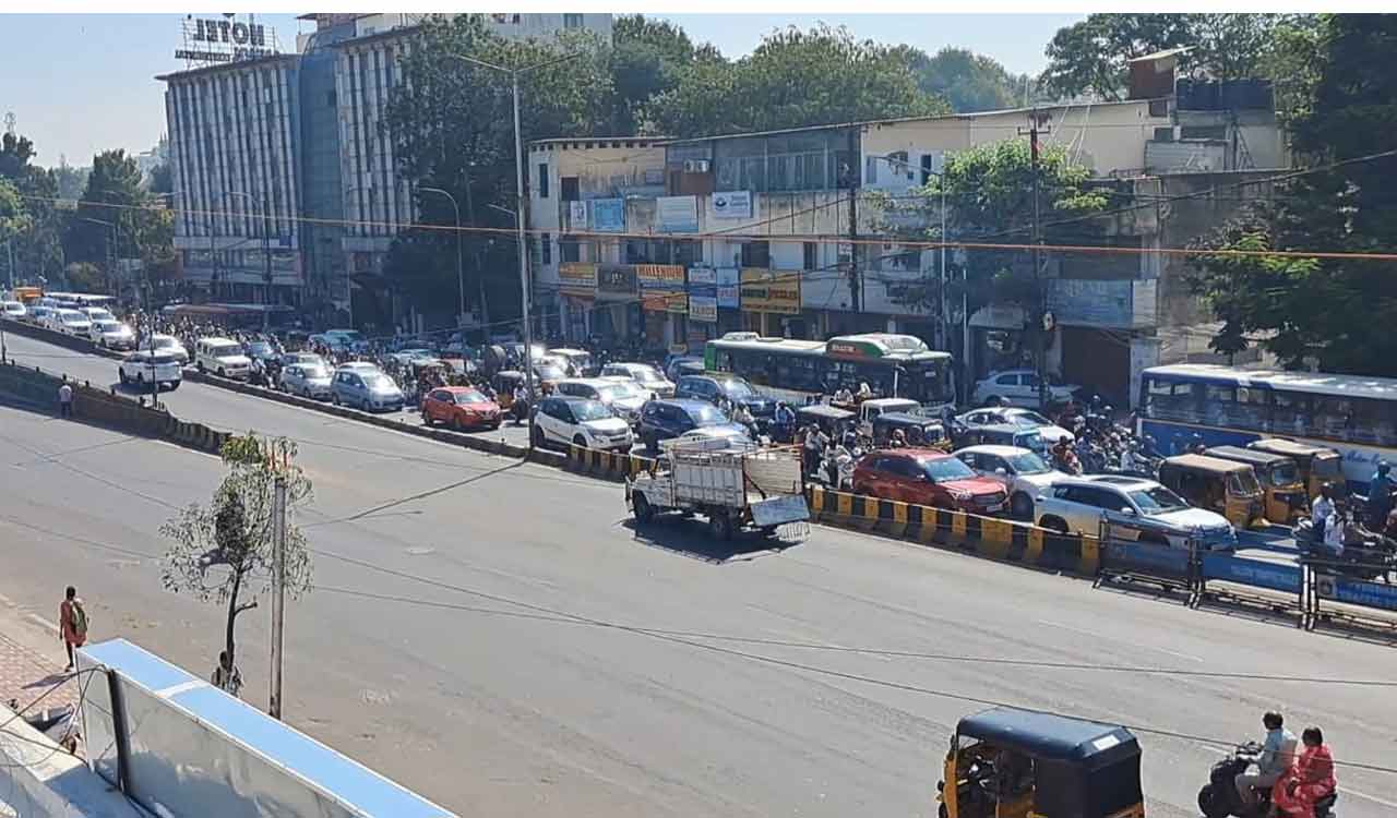 Driver injured as container truck crashes into road median, causing traffic jam at Lakdi-ka-Pul