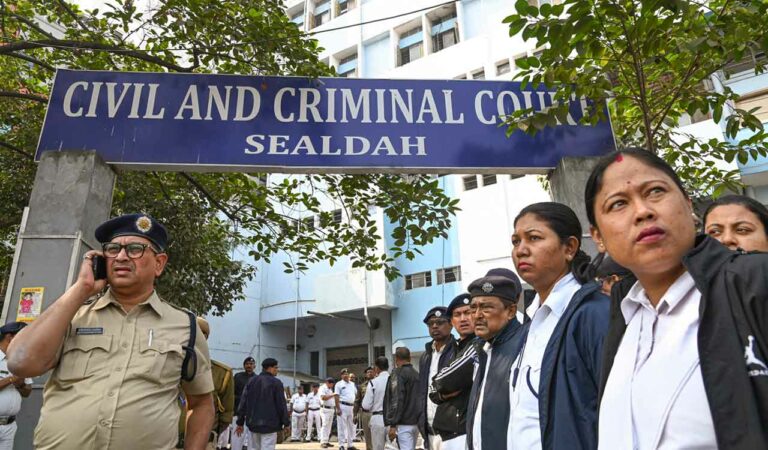 Police personnel keep vigil outside the Sealdah court, in Kolkata on Saturday. Photo: PTI
