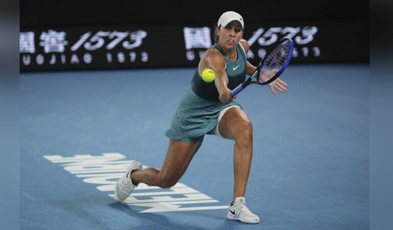 Madison Keys of US plays a backhand return to Iga Swiatek of Poland during their semifinal match at the Australian Open in Melbourne, on Thursday. Photo: AP