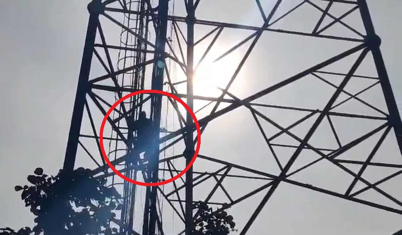 Siddipet: Man climbs cell tower in protest over exclusion from Indiramma Housing Scheme beneficiary list