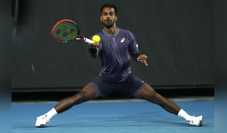 India’s Sumit Nagal in action against Czech Republic’s Tomas Machac during their first round match at Australian Open in Melbourne, on Sunday. Photo: AP/PTI