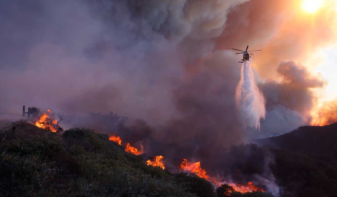 5 killed, thousands flee homes as wildfire burns across Los Angeles