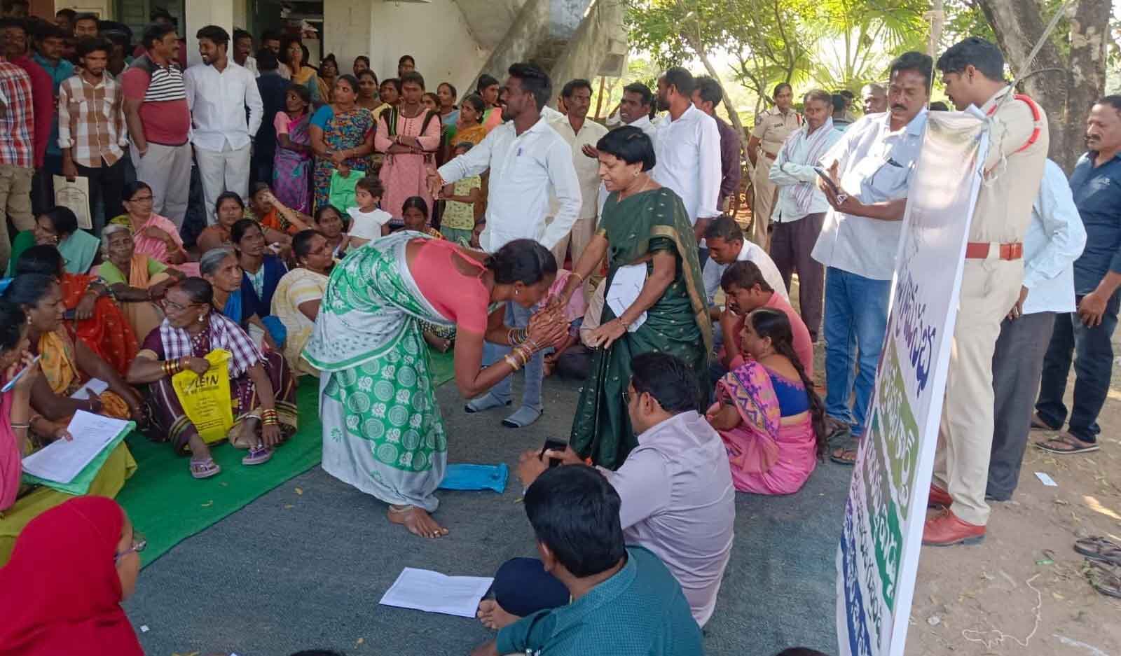 Woman touches official’s feet, pleads for Indiramma house during gram sabha