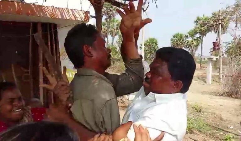 Congress leader T Biksham attacking beneficiaries of double bedroom houses.