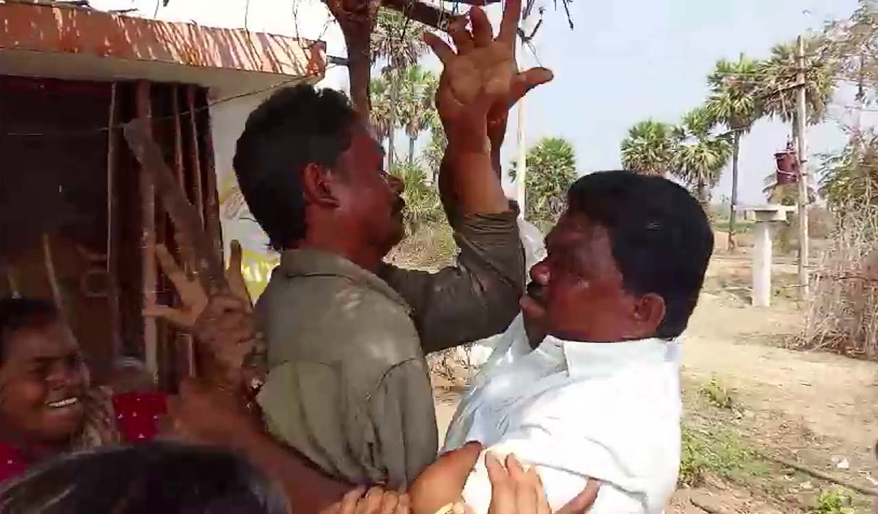 Watch: Congress leader, supporters attack 2BHK beneficiaries at Yellandu in Kothagudem
