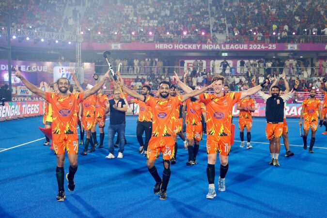 Players of Shrachi Rarh Bengal Tigers after their HIL title win on Saturday. Photo: X