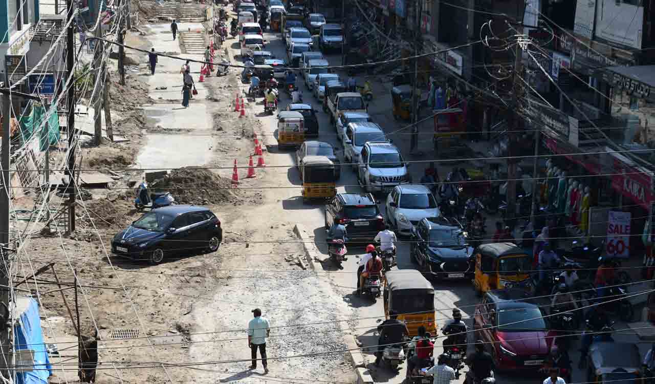 Hyderabad roads cry for attention; potholes, overflowing drains turn driving into nightmare