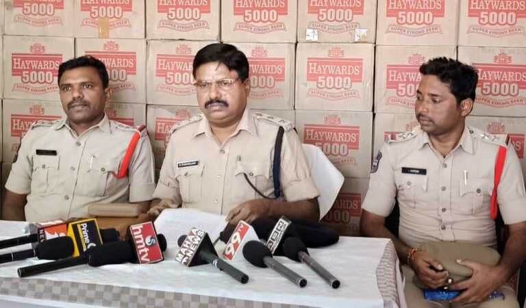 DSP Ramanujam briefs details of seizure of liquor to press men in Chintalamanepalli mandal centre on Wednesday.