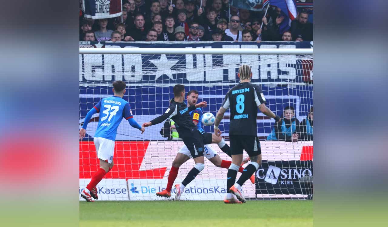 Leverkusen stay in title hunt with 2-0 win over Holstein Kiel