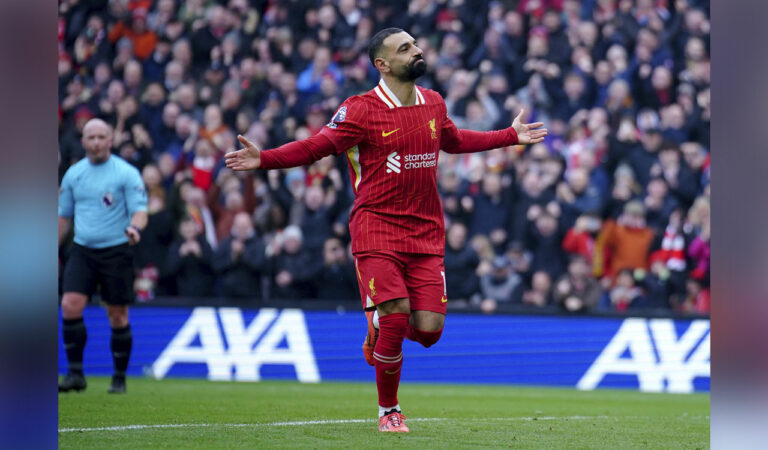 Liverpool’s Mohamed Salah celebrates after scoring his side second goal during the Premier League match against Wolverhampton Wanderers at Anfield Stadium in Liverpool, on Sunday. Photo: AP
