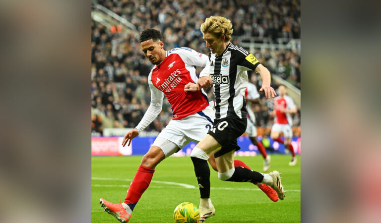 Newcastle United’s Anthony Gordon (right) and Arsenal’s William Saliba vie for the ball during the Carabao Cup semfinal 2nd leg match at St. James' Park.