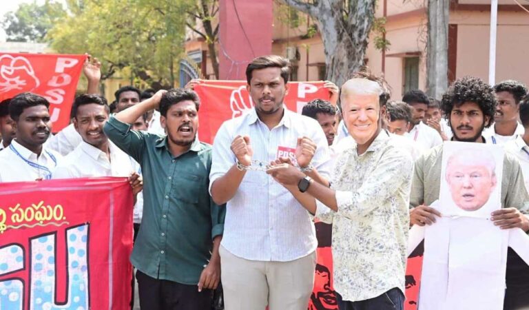 PDSU Khammam district committee stage protest against deportation of Indians from US in handcuffs.