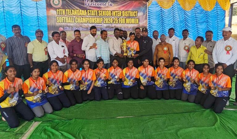 Nizamabad team with winners trophy on Monday.