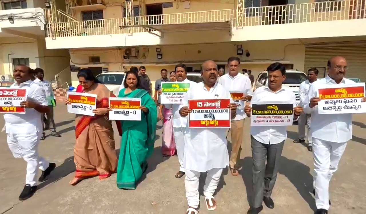 BRS MLCs stage protest against rising debts in Telangana Council