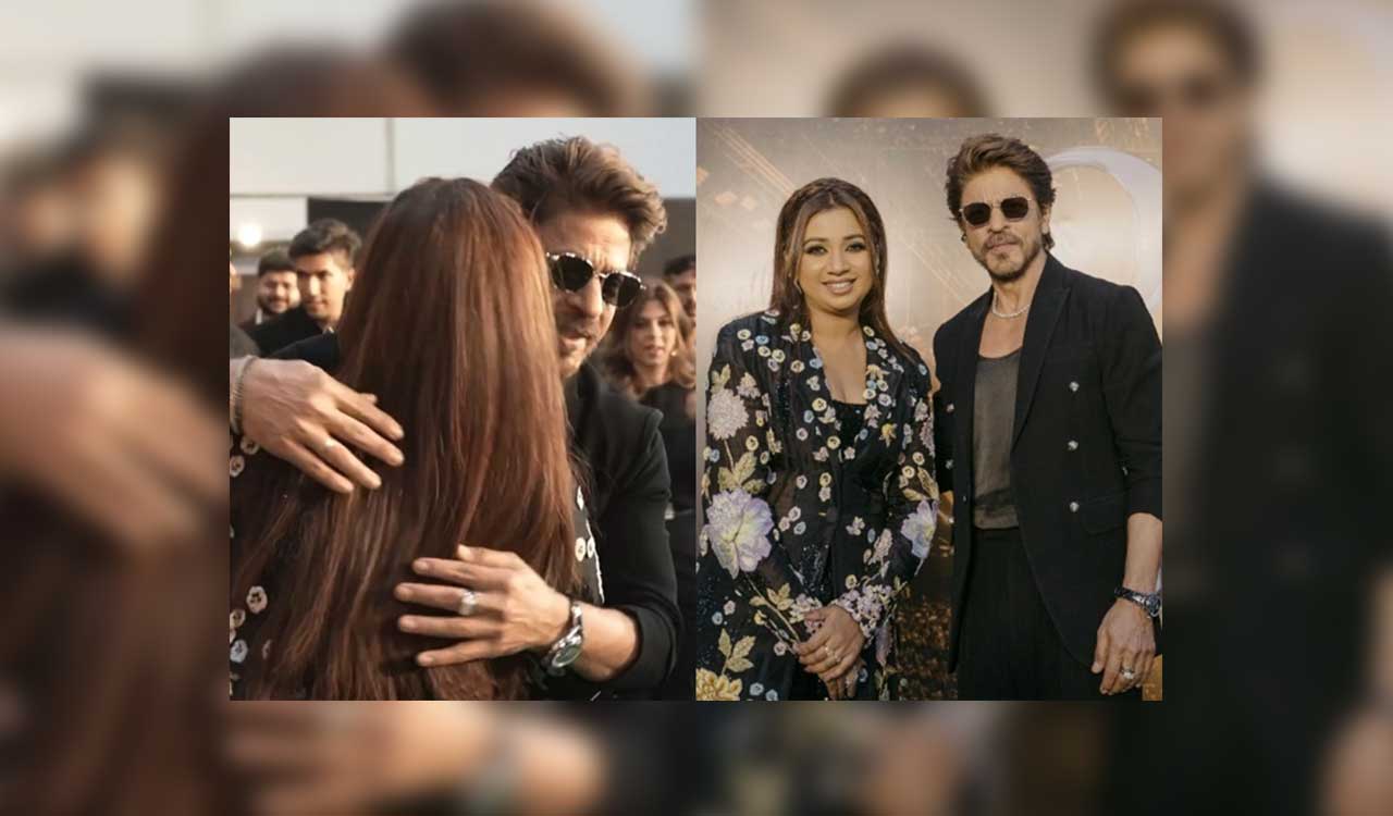 Shah Rukh Khan gives a warm hug to Shreya Ghoshal
