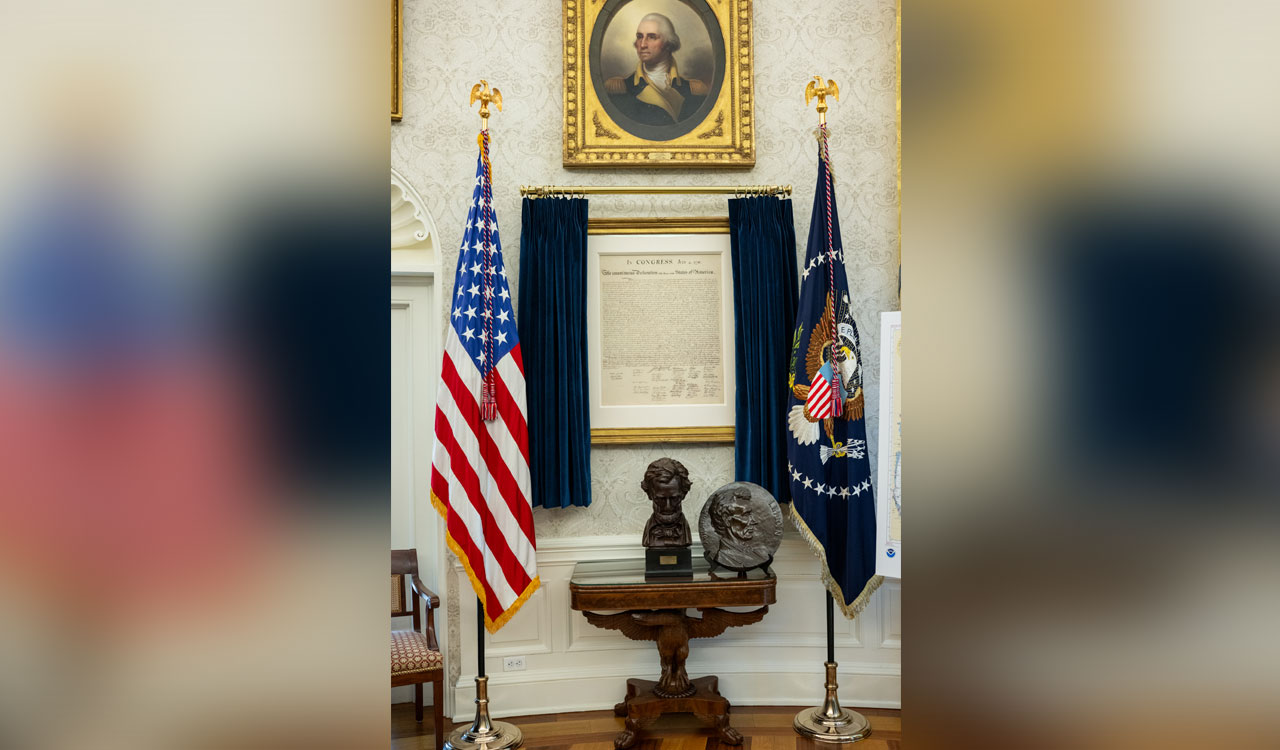Donald Trump hangs copy of Declaration of Independence in Oval Office
