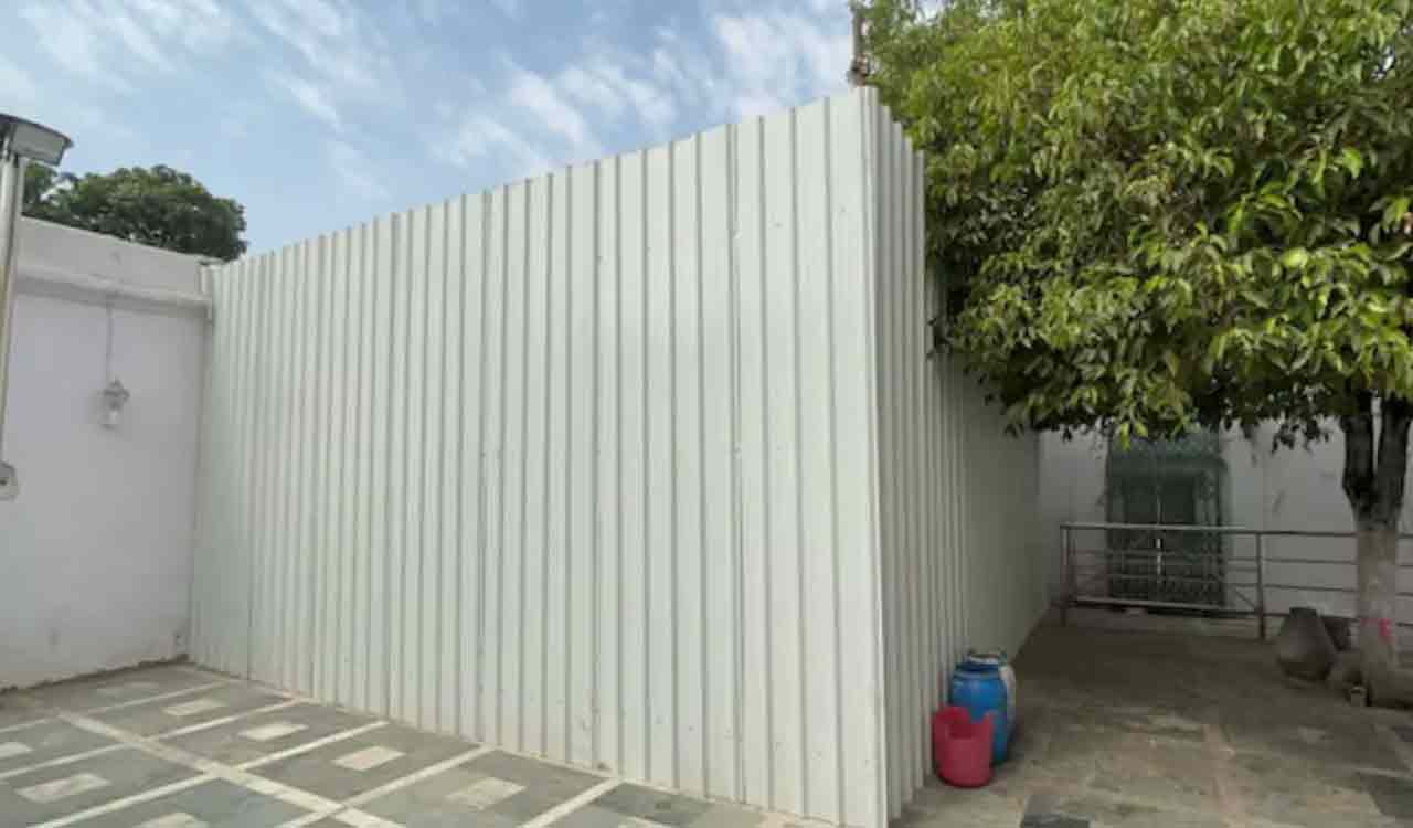 Tin sheets erected on two sides of Aurangzeb’s tomb