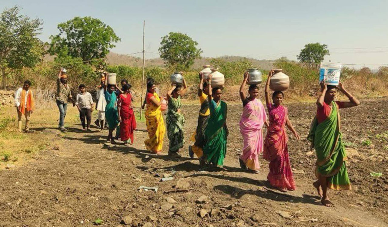 Former minister shares picture of plight of tribals in fetching drinking water in Adilabad