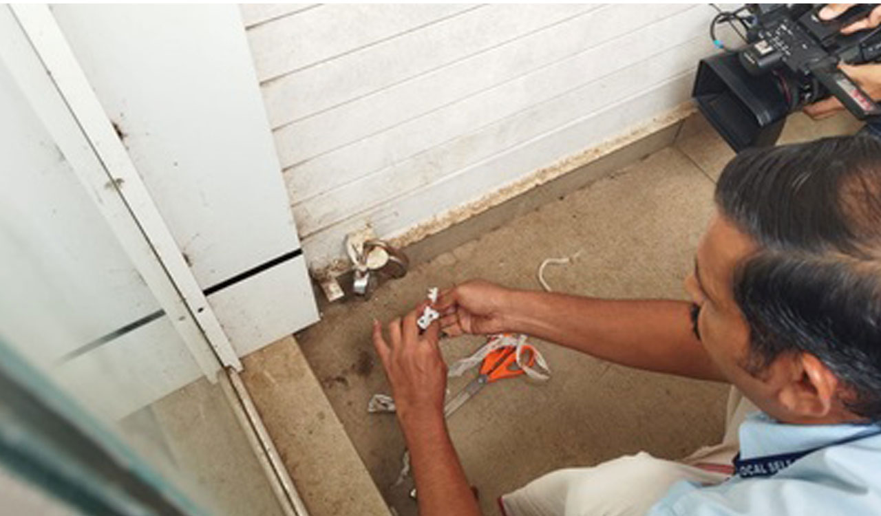 District judge, collector unlock sealed shop to rescue a trapped sparrow