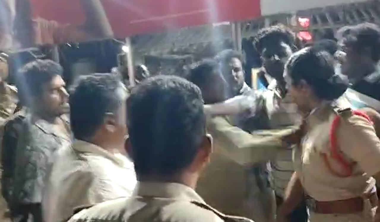 Watch: Congress leader manhandles woman SI, booked in Khammam