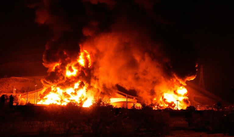 A Ukrainian drone attack set a Russian oil depot ablaze in Sochi, while both sides exchanged strikes. Zelenskyy announced an agreement to exchange 1,200 prisoners amid ongoing hostilities and peace deadline pressure.