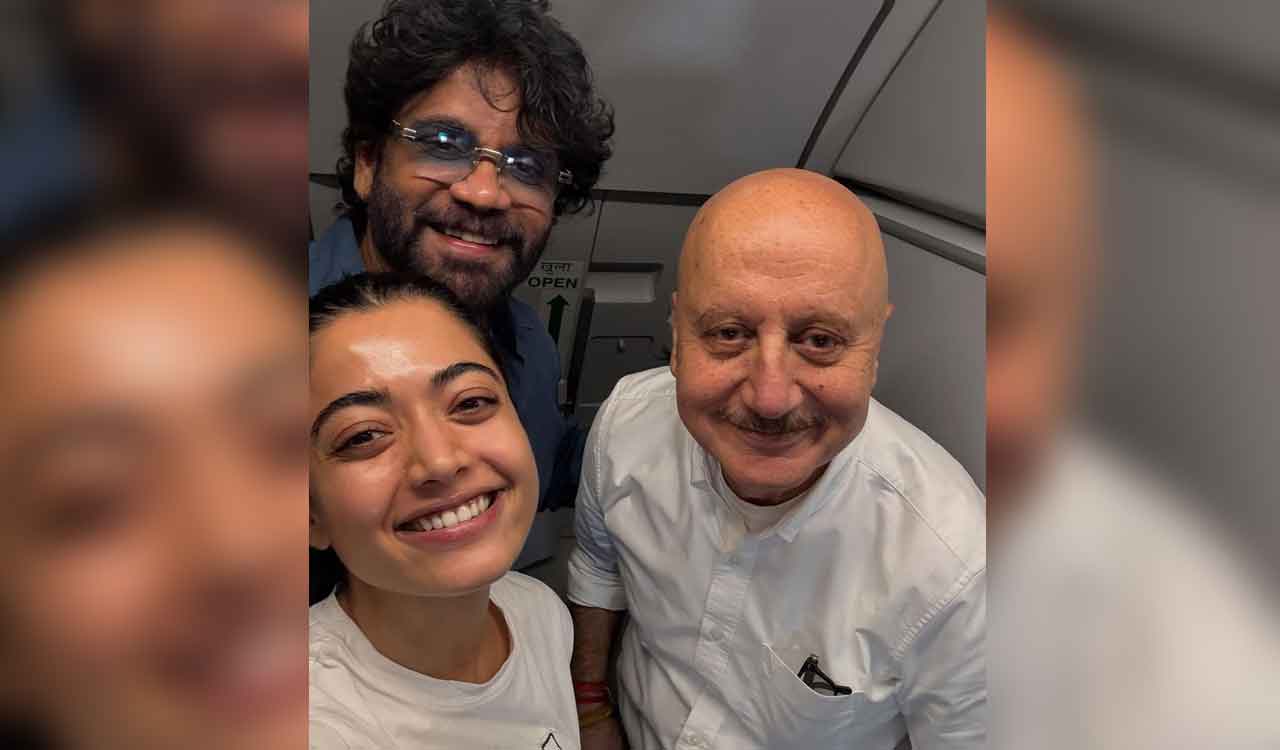 Rashmika clicks a selfie with Anupam Kher and Nagarjuna on Hyderabad-Mumbai flight