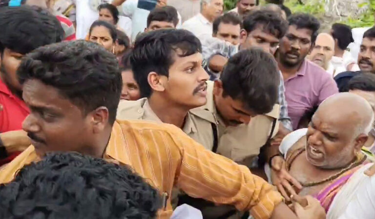 Temple EO faints during clash with land grabbers at Bhadrachalam temple lands in AP