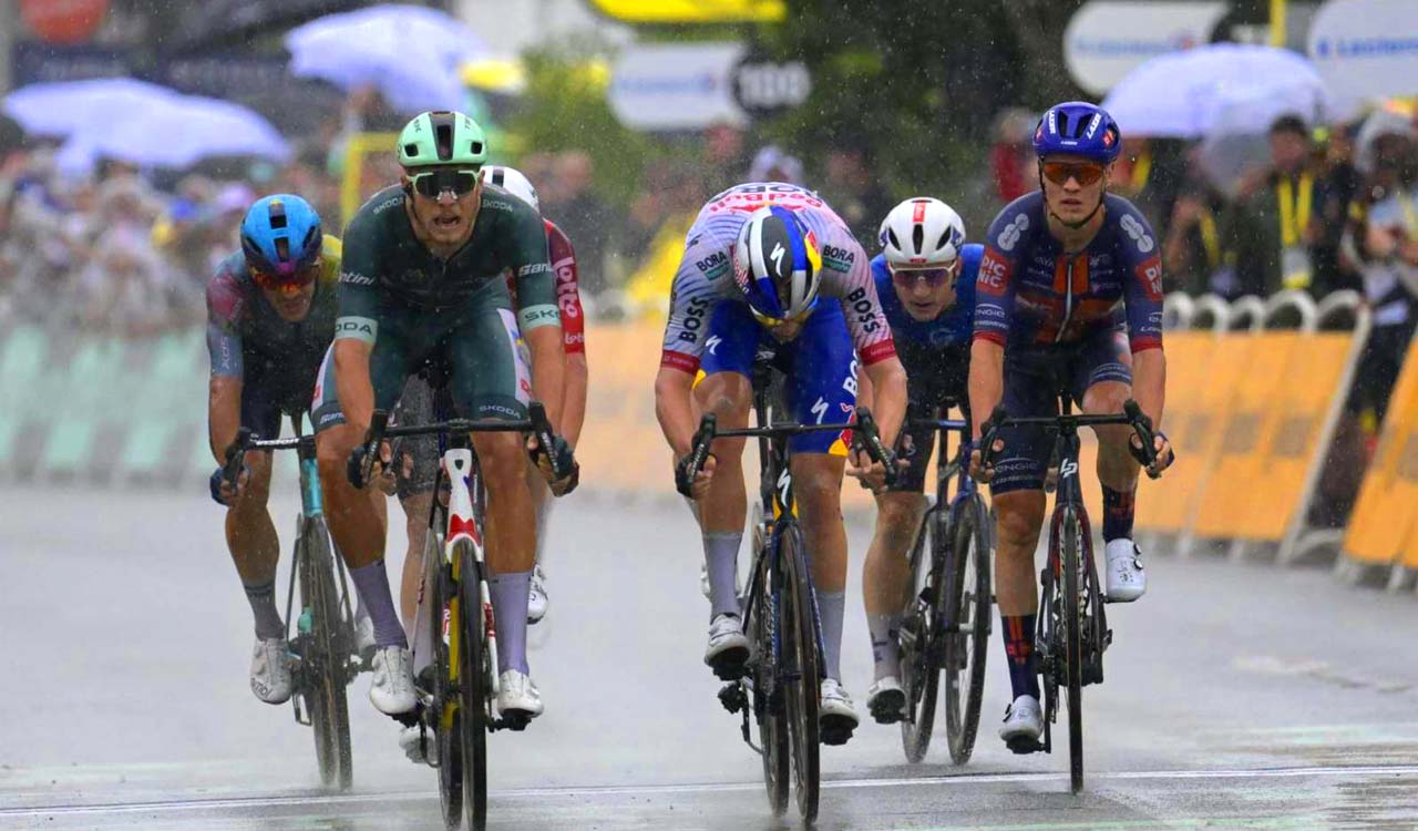 Milan wins rain-soaked Stage 17 as crash disrupts sprint finish in Tour de France