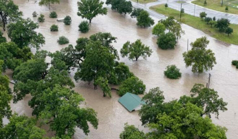 Heavy rains across Texas paused ongoing flood victim searches and triggered new rescues and evacuations. Kerrville and nearby areas saw widespread damage, strained emergency responses, and concerns over alert systems.