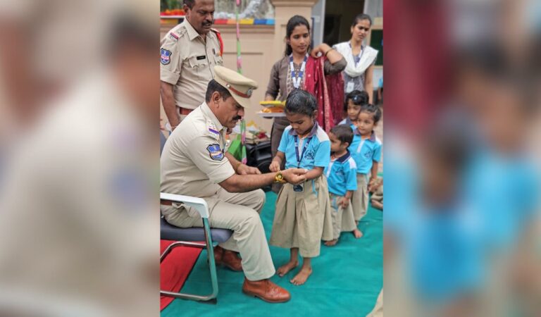 School children tie Rakhis to cops in Mancherial