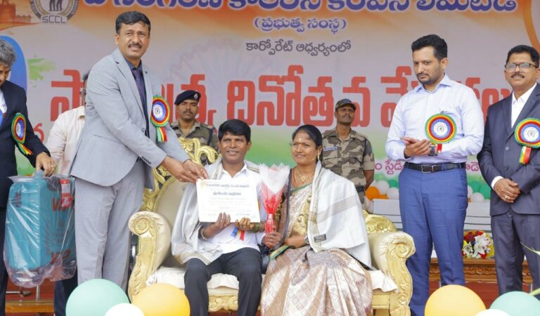 SCCL CMD, N Balram felicitating an employee at Independence Day celebrations in Kothagudem.
