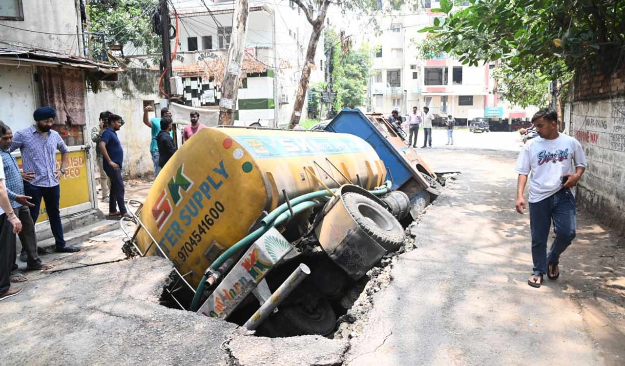 Road caves-in at Banjara Hills after water tanker runs over nala, no casualties