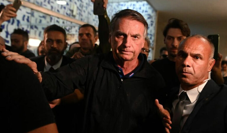 Brazil’s ex-president Jair Bolsonaro was discharged after skin cancer treatment in Brasilia. He remains under house arrest amid legal cases, including a 27-year prison sentence and a court-ordered racism fine.