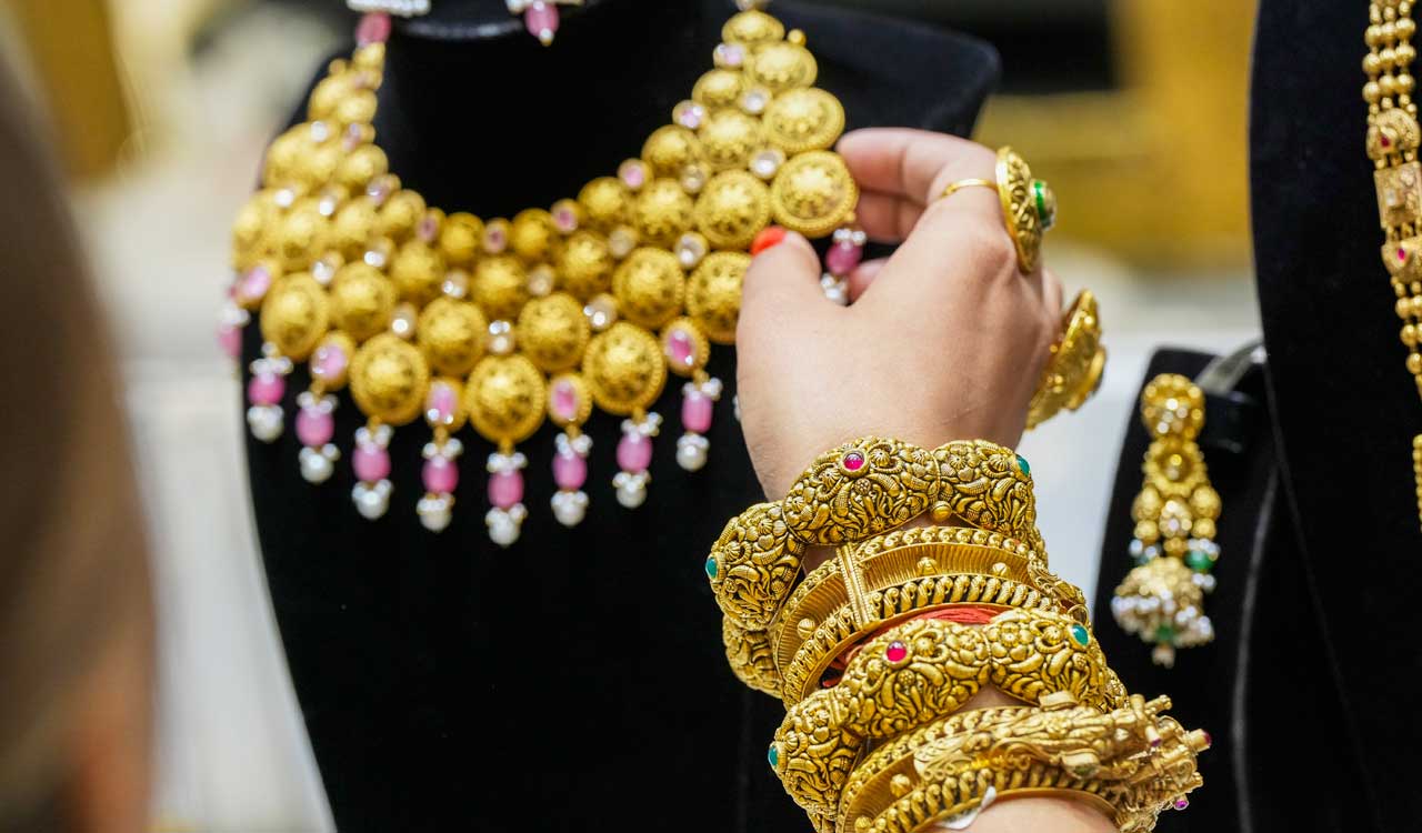 Gold prices surge to record high amid safe haven demand