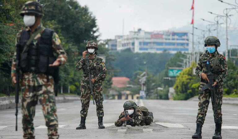 Army personnel deployed on the route to the Parliament amid curfew in the wake of the anti-government protests, in Kathmandu, Nepal.