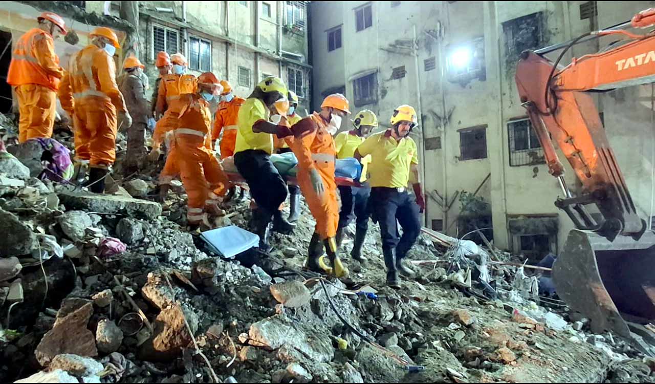 Rescuers run oxygen to survivors trapped in Indonesia school collapse; dozens buried