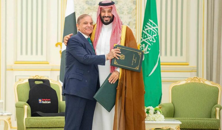 Pakistani Prime Minister Shehbaz Sharif embracing Saudi Arabias Crown Prince Mohammed bin Salman after signing a joint defence pact in Riyadh, Saudi Arabia.
